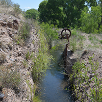 Irrigation ditch along the Gila River. Photo Credits: Mary Harner